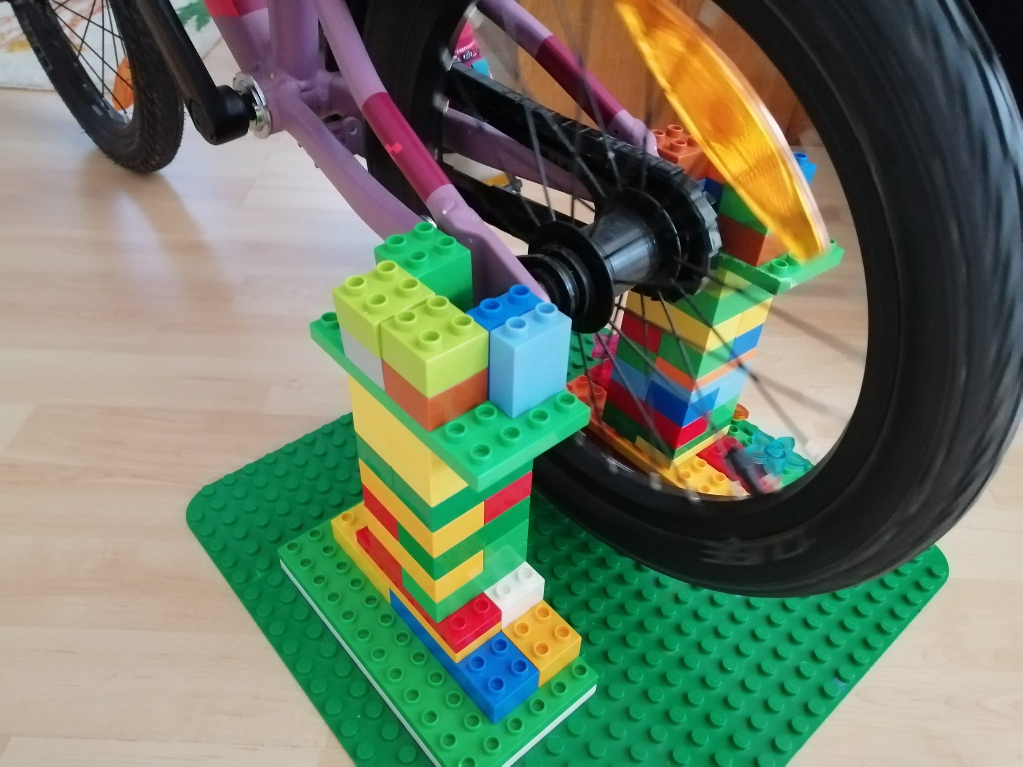 a basic indoor trainer created by two towers of LEGo bricks